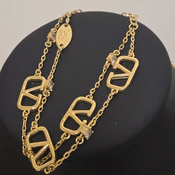 Valentino Gold Necklace and Bracelet Set - Picture 5 of 13